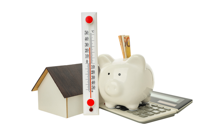 Symbolbild für Heizkosten, Energieeffizienz und finanzielle Planung: Haus, Thermometer und Sparschwein verdeutlichen Kostenanalyse und Einsparpotenziale
